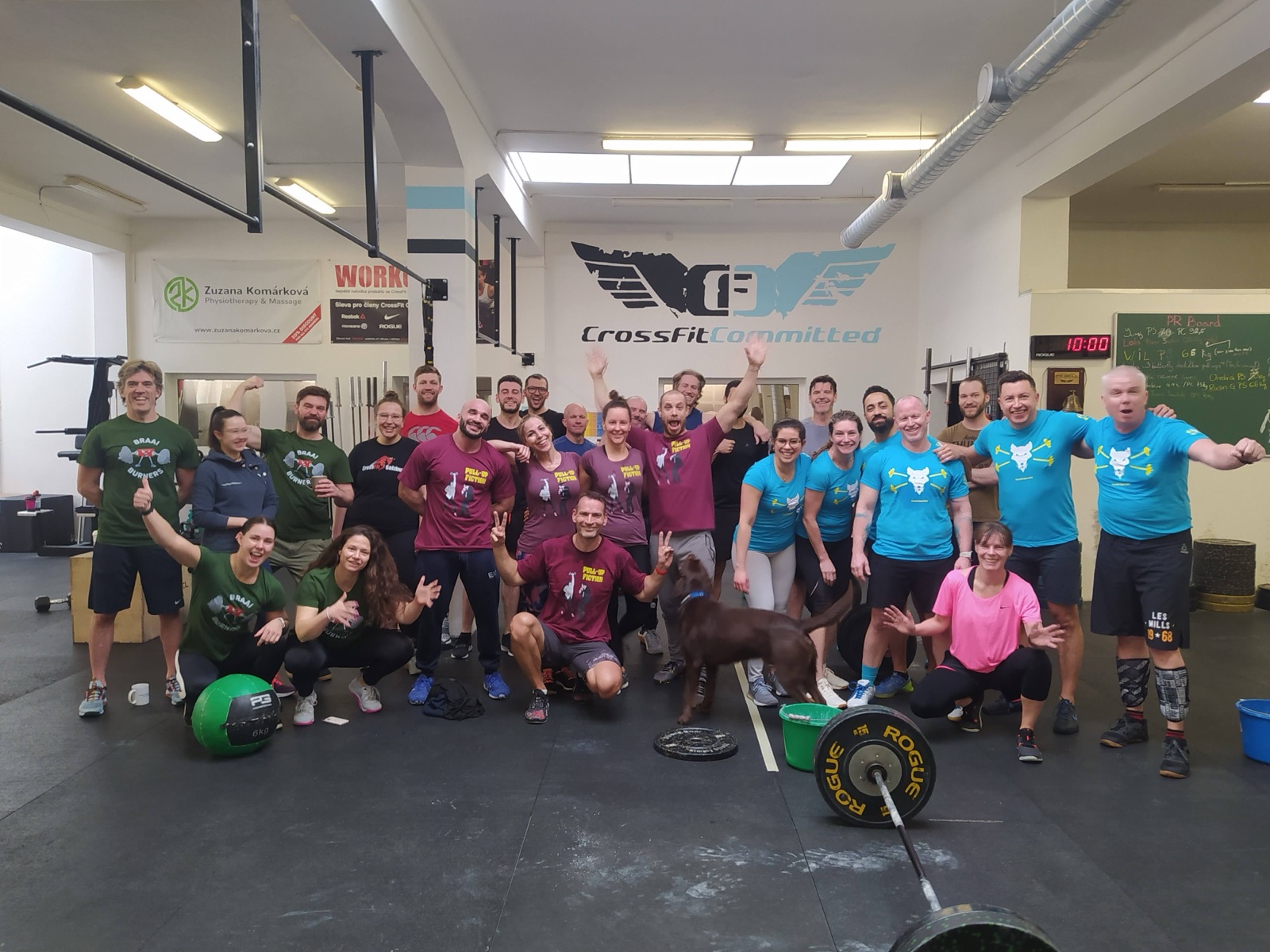 The community posing together after a workout, dog included