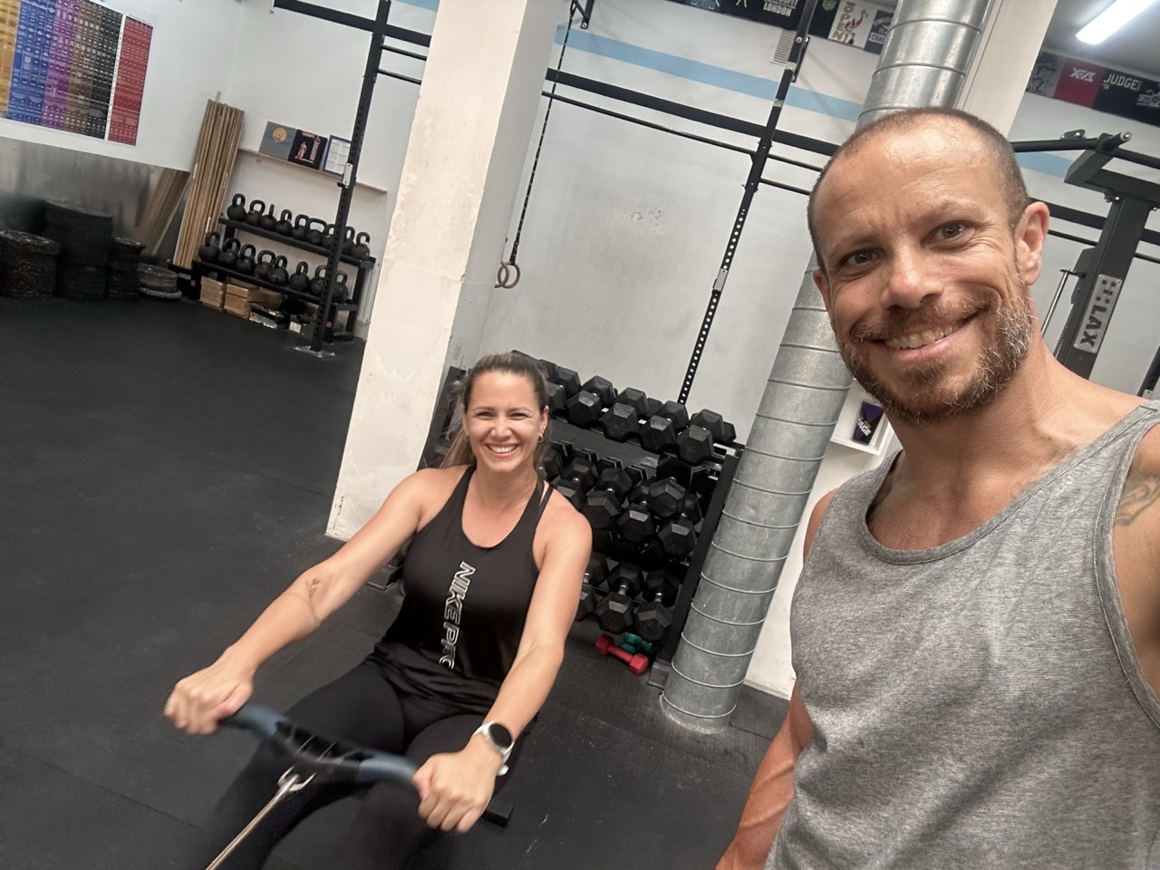 Joey coaching a client one on one at CrossFit Committed